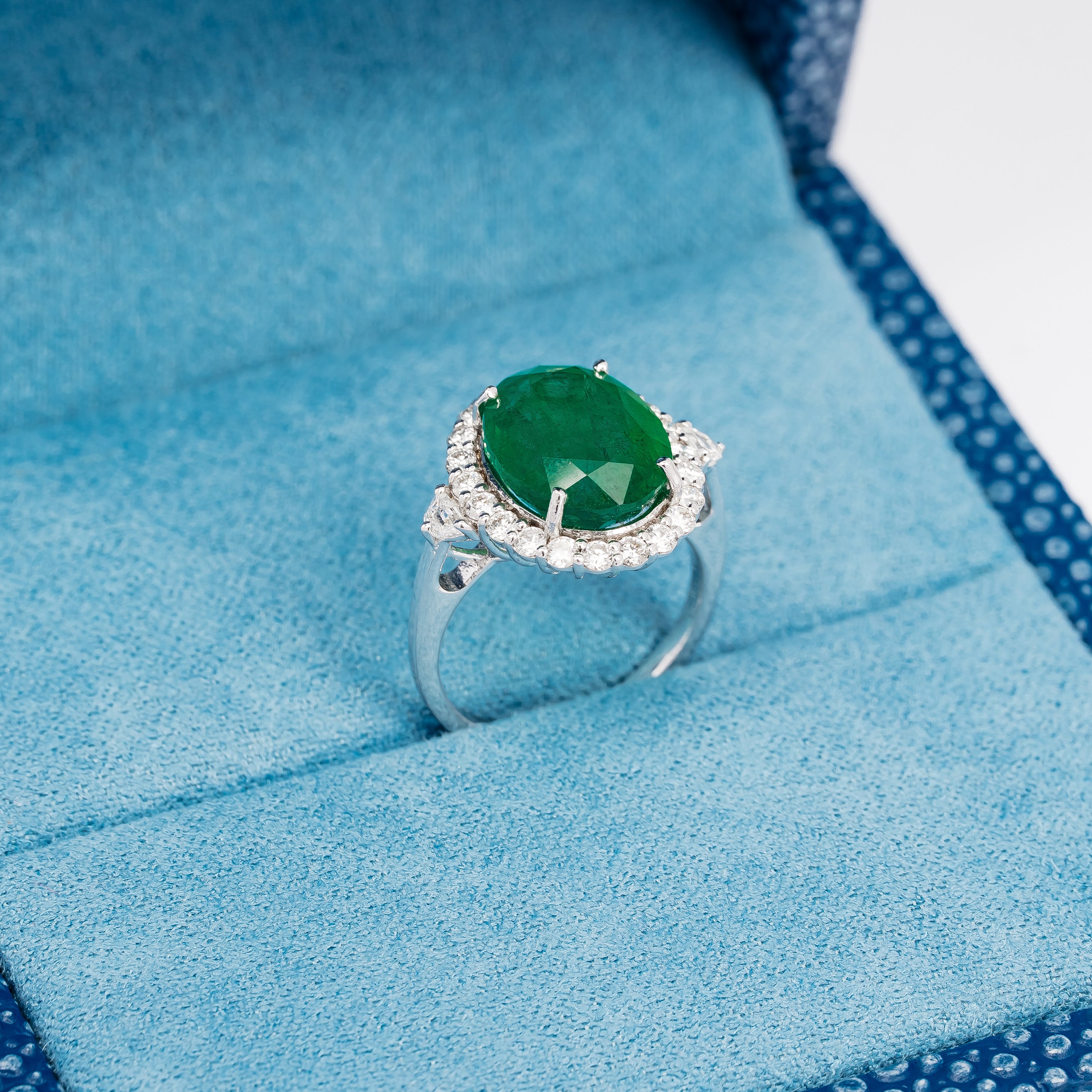 White gold emerald and diamond ring