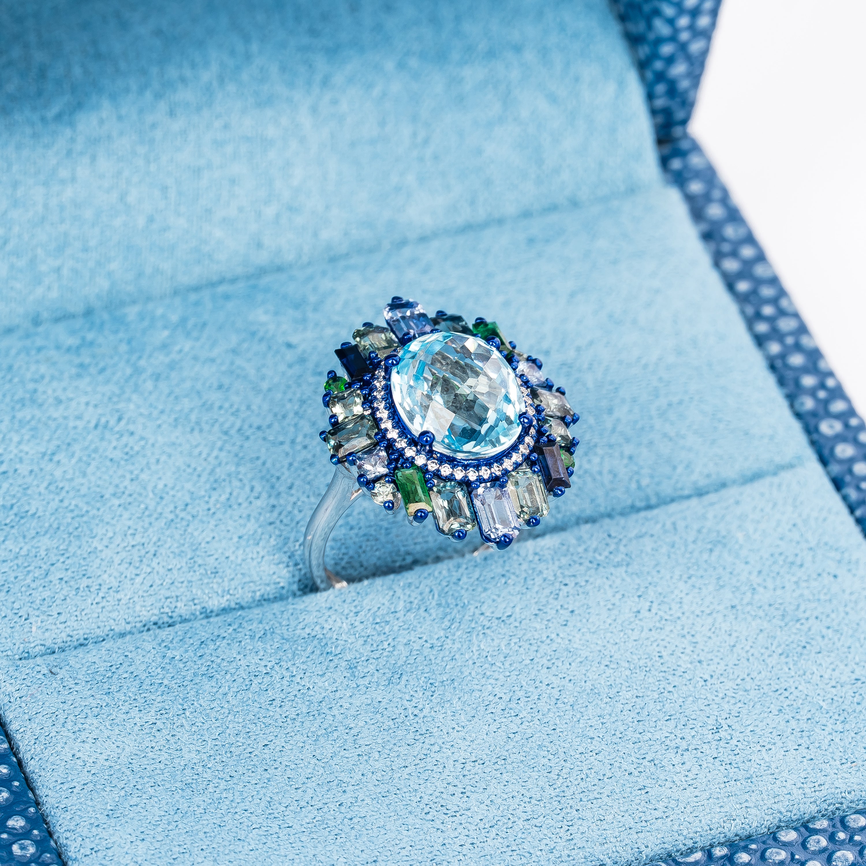 BLUE TOPAZ AND COLORED STONES RING