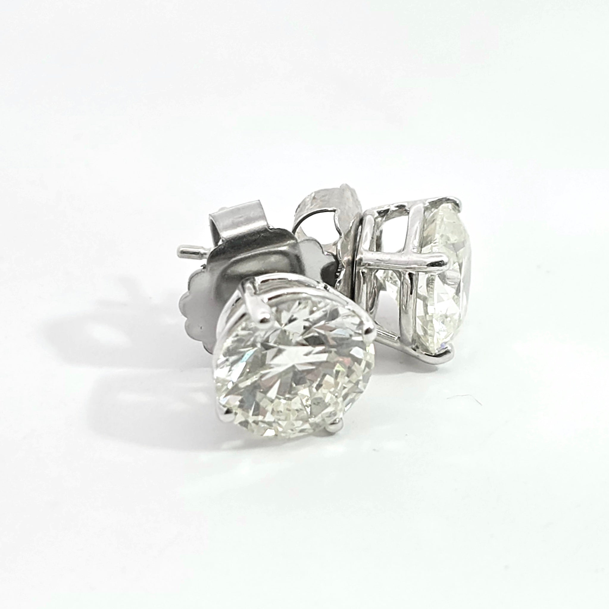 White Gold Stud Earrings With Diamond Stones