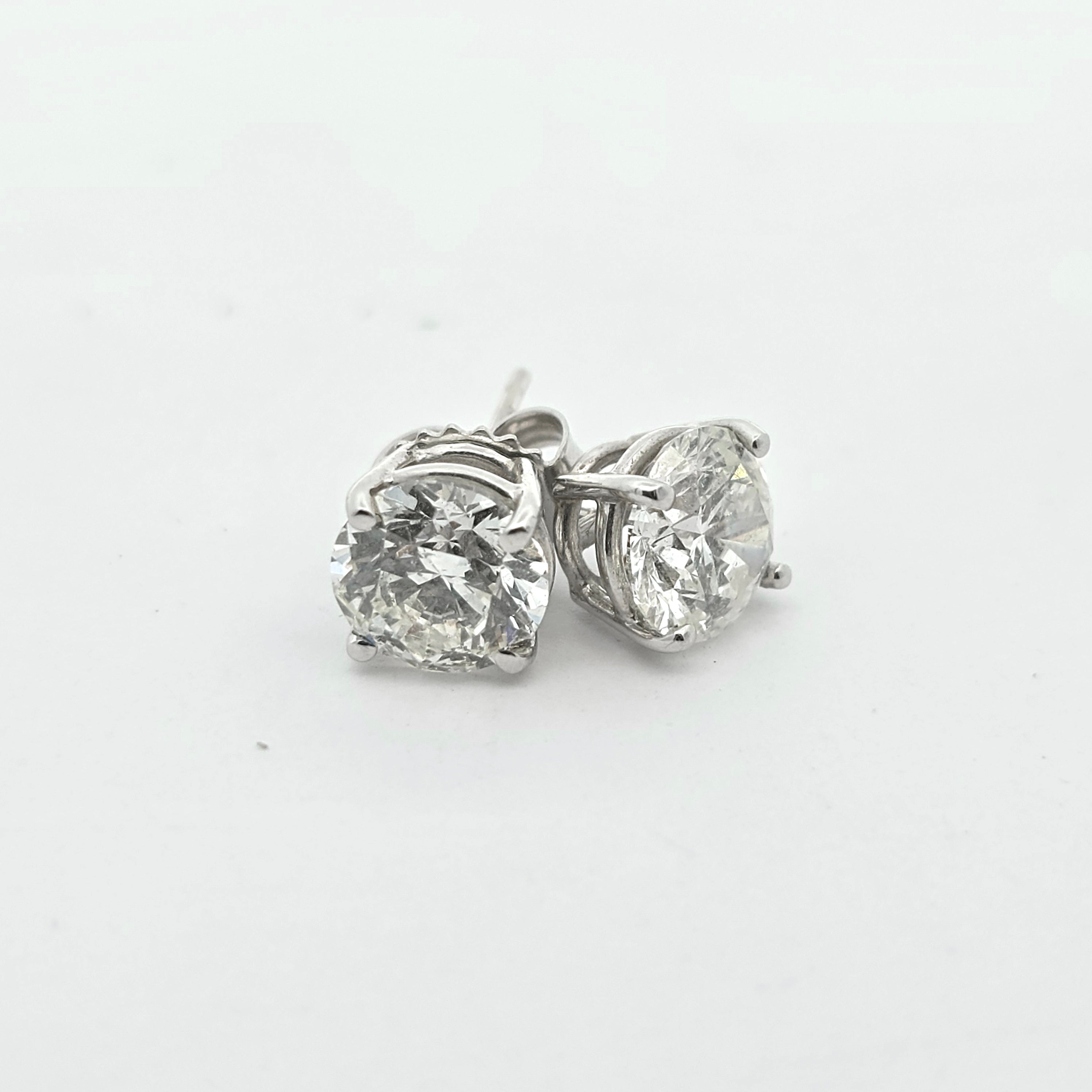 White Gold Stud Earrings With Diamond Stones