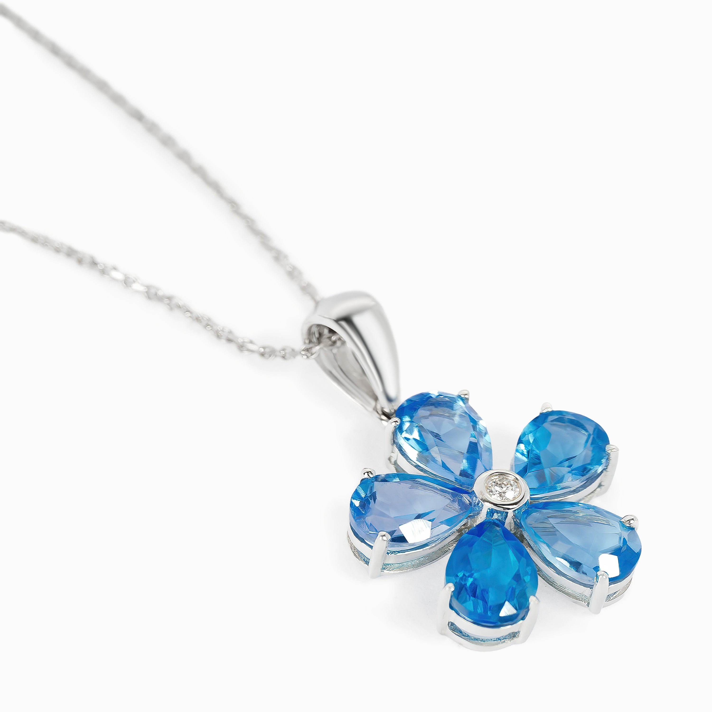 BLUE TOPAZ FLORAL PENDANT